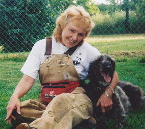 Pam Simmons and her Russell Terrier hunting for a fox